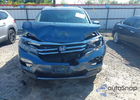 2018 Honda Pilot Touring z USA, uszkodzony, nr VIN 5FNYF5H92JB015751